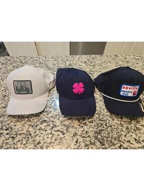 3 Golf Hats. Black Clover is stretch Fit L/XL. Others are snapback